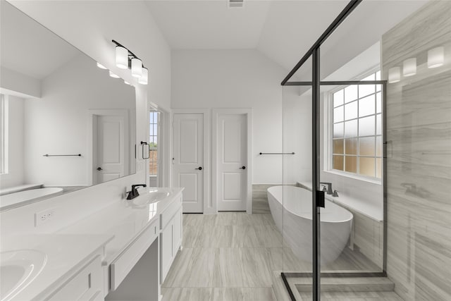 bathroom with lofted ceiling, vanity, a wealth of natural light, and shower with separate bathtub