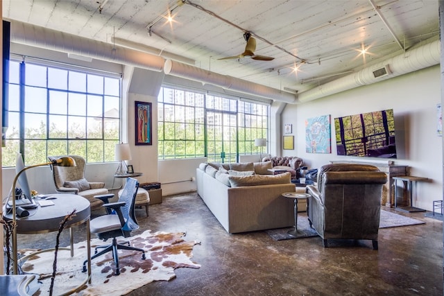 living room featuring ceiling fan