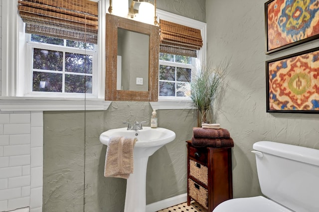 bathroom with toilet and sink