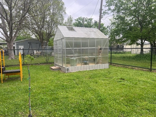 view of outdoor structure with a yard