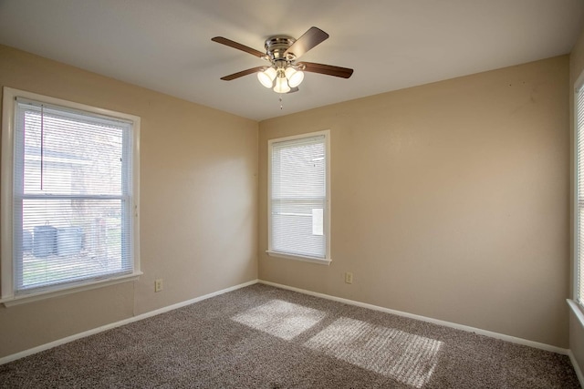 empty room featuring carpet floors and ceiling fan