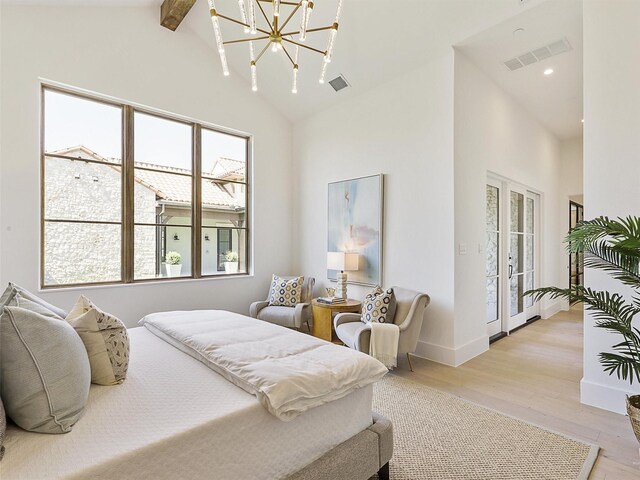 bedroom with high vaulted ceiling, beamed ceiling, light wood-type flooring, access to outside, and a chandelier