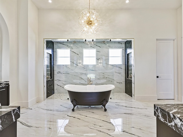 bathroom featuring vanity, a healthy amount of sunlight, and separate shower and tub