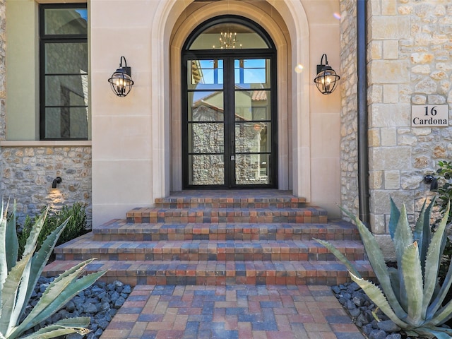 property entrance featuring french doors