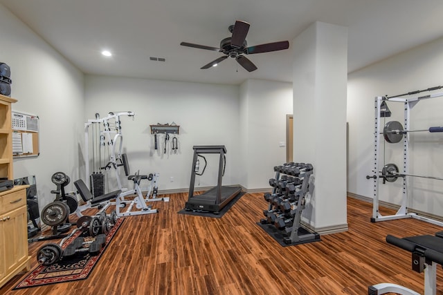 workout area featuring ceiling fan and wood-type flooring