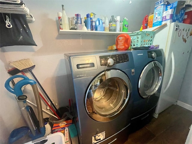 washroom with independent washer and dryer