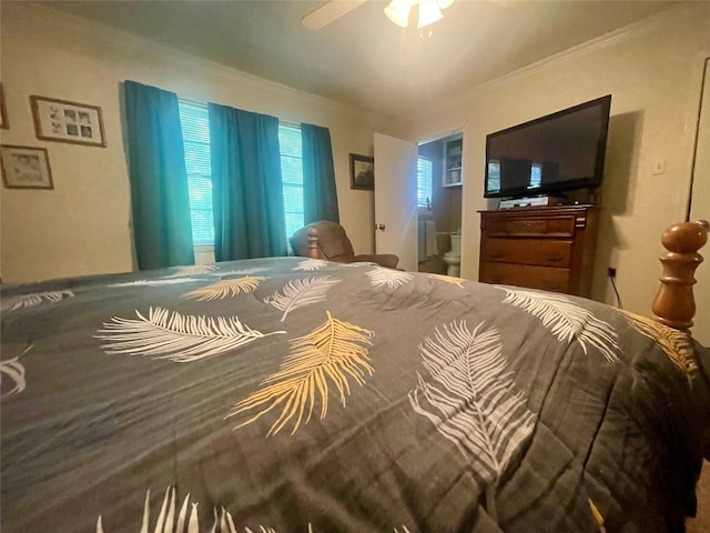 bedroom featuring ensuite bathroom and ceiling fan