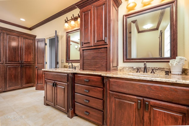 bathroom featuring vanity, tile patterned floors, and ornamental molding