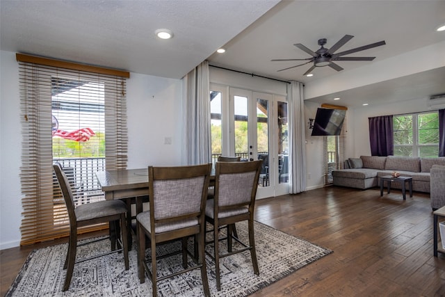 dining room featuring ceiling fan, dark hardwood / wood-style flooring, and french doors