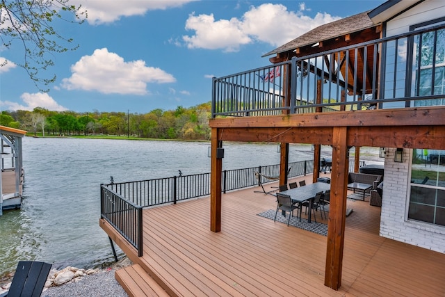 dock area with a water view