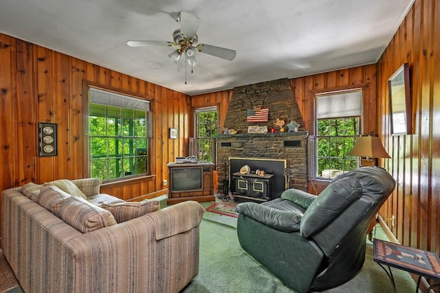 68 Zumwalt Ln, Pottsboro, TX 75076 - living area featuring wooden walls, carpet, and a ceiling fan