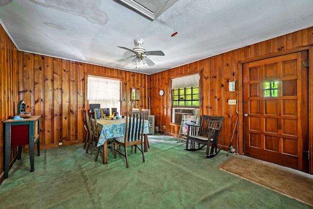 68 Zumwalt Ln, Pottsboro, TX 75076 - dining area featuring healthy amount of natural light, carpet, wooden walls, and ceiling fan