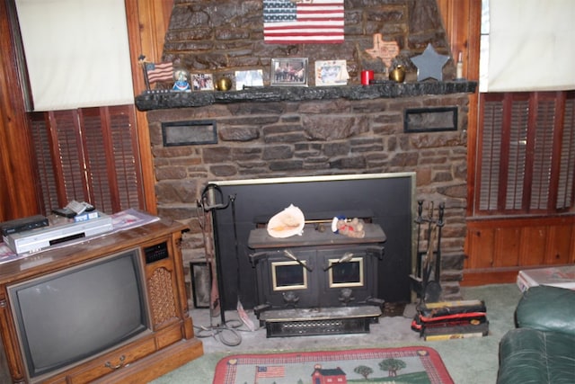 details with carpet and a fireplace