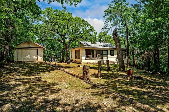 68 Zumwalt Ln, Pottsboro, TX 75076 - view of front facade with a garage and an outdoor structure