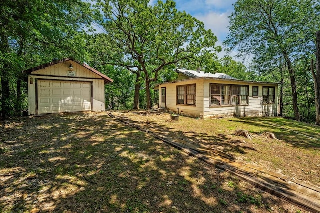 68 Zumwalt Ln, Pottsboro, TX 75076 - view of yard featuring a garage and an outdoor structure