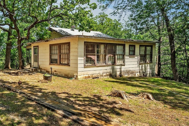 68 Zumwalt Ln, Pottsboro, TX 75076 - view of side of property featuring a yard and entry steps