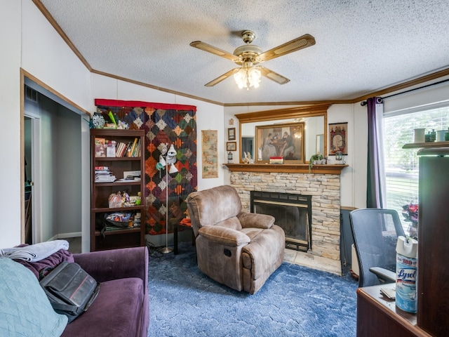 living area with ceiling fan, a fireplace, dark carpet, vaulted ceiling, and crown molding