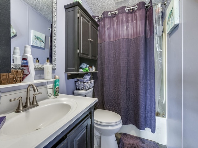 full bathroom with shower / tub combo, toilet, vanity, and a textured ceiling