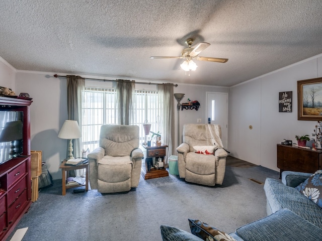 living room featuring crown molding, carpet flooring, a textured ceiling, and ceiling fan