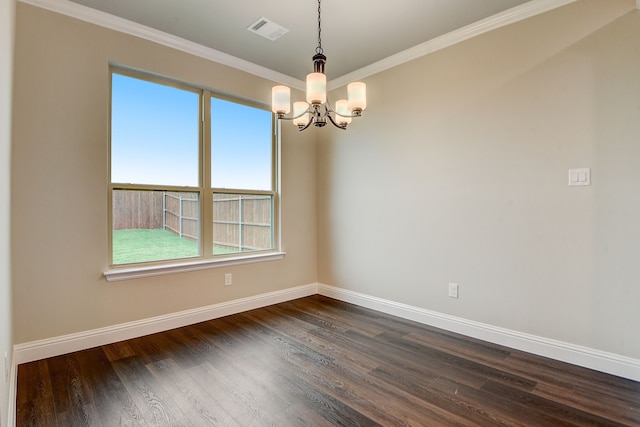 unfurnished room with ornamental molding, an inviting chandelier, and dark hardwood / wood-style flooring