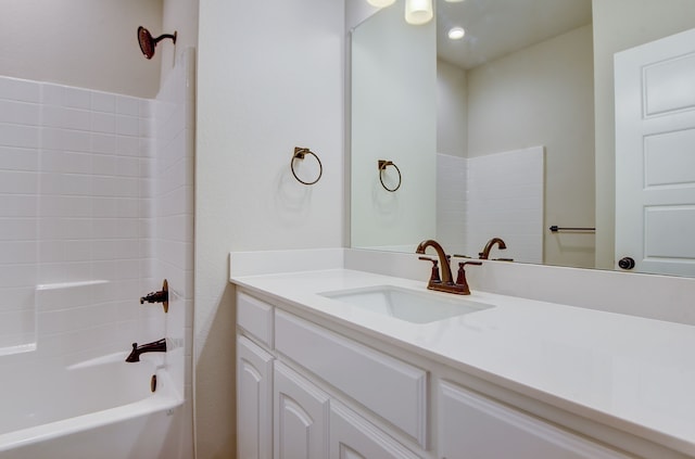 bathroom with vanity and bathing tub / shower combination