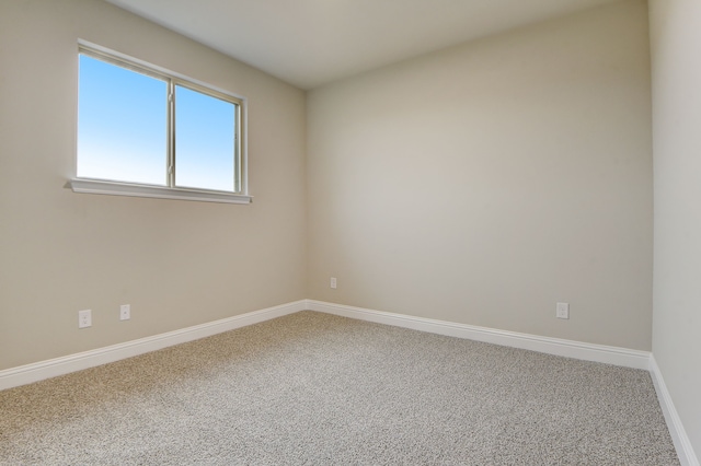 empty room featuring carpet floors