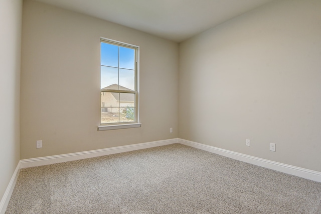 empty room featuring carpet flooring