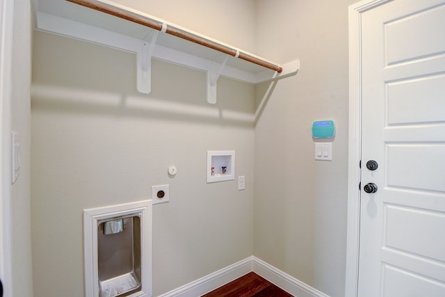 clothes washing area featuring washer hookup, hookup for a gas dryer, electric dryer hookup, and dark hardwood / wood-style floors