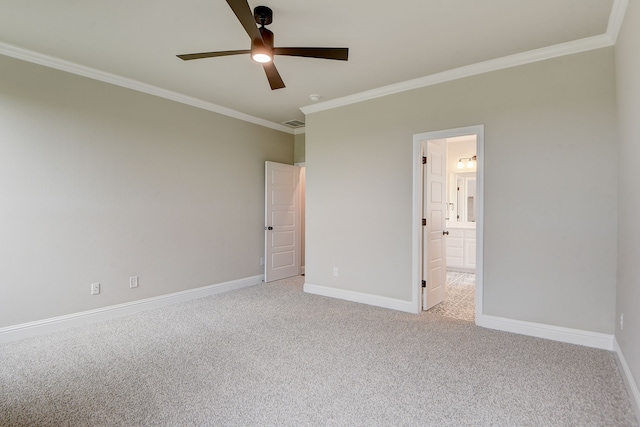 unfurnished bedroom with connected bathroom, crown molding, carpet flooring, and ceiling fan