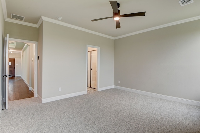 unfurnished bedroom with crown molding, light carpet, and ceiling fan