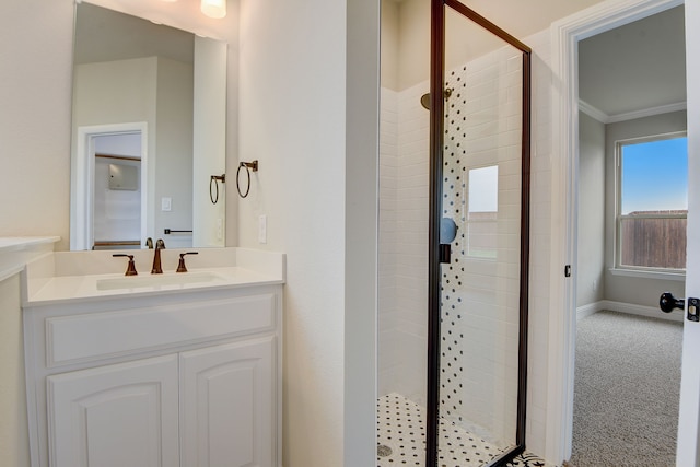 bathroom with walk in shower, ornamental molding, and vanity