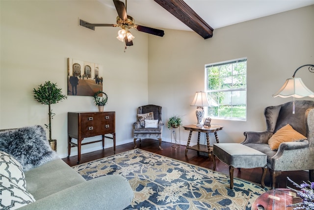 living room featuring beam ceiling, ceiling fan, and hardwood / wood-style floors