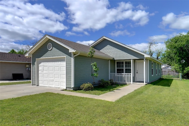 ranch-style house featuring a front lawn and a garage