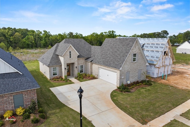 view of front of home with a front yard