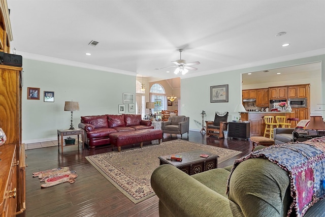 living room with ceiling fan, dark hardwood / wood-style flooring, and crown molding