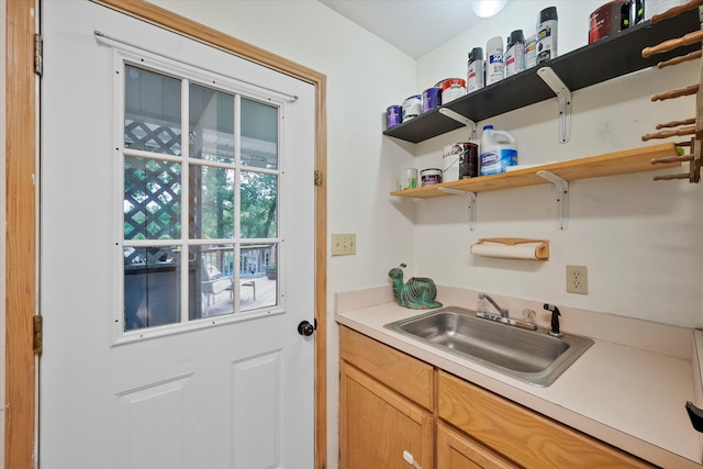 kitchen featuring sink and light brown cabinets