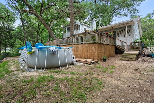 view of yard featuring a swimming pool side deck