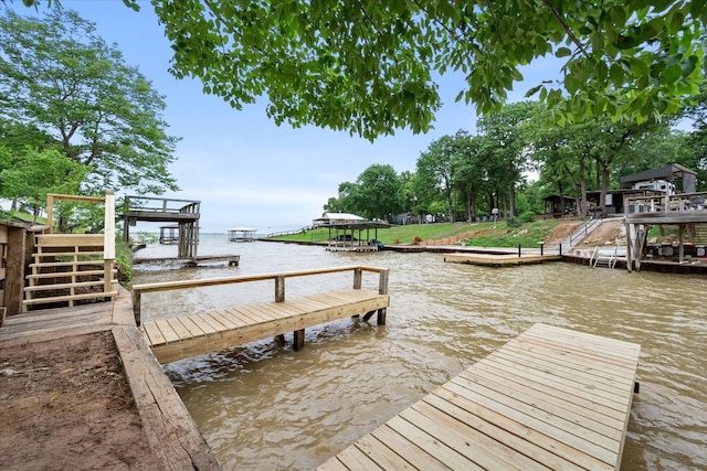 dock area featuring a water view