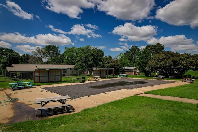 surrounding community featuring a yard