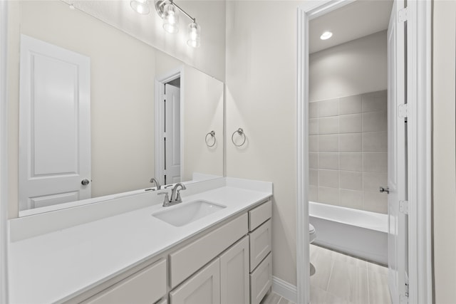 full bathroom featuring tub / shower combination, tile flooring, toilet, and vanity