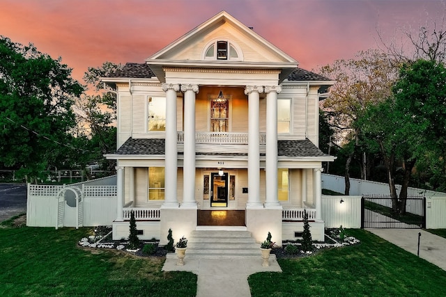 exterior space featuring a yard and covered porch