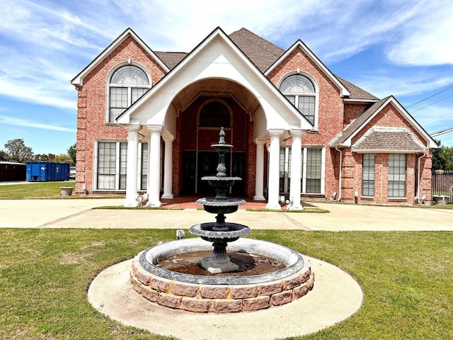 exterior space featuring a front lawn