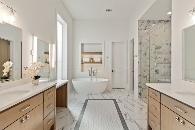 bathroom featuring vanity and plus walk in shower