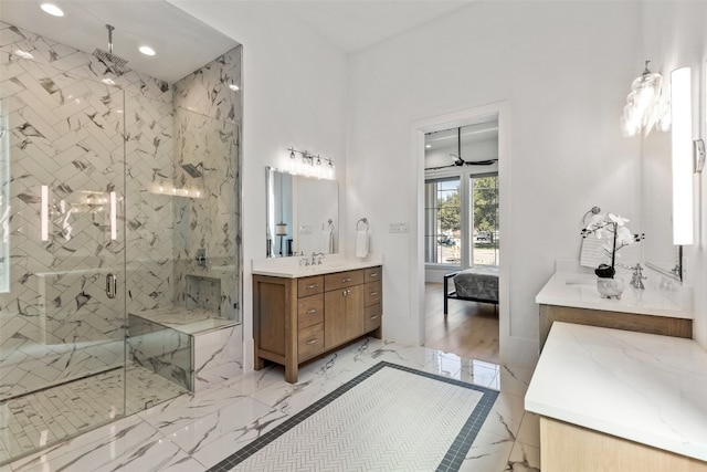 bathroom featuring hardwood / wood-style flooring, vanity, ceiling fan, and a shower with door