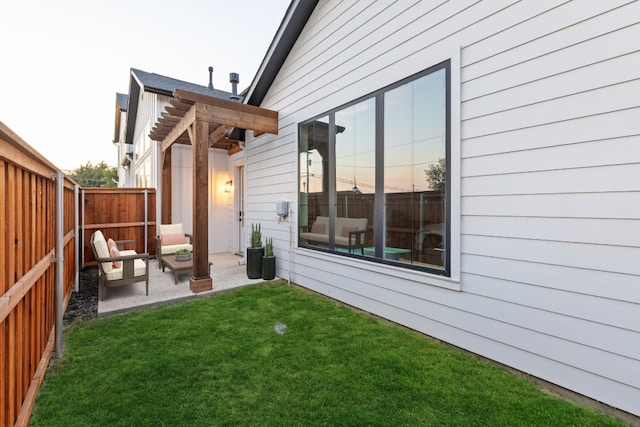 exterior space featuring a patio and a yard