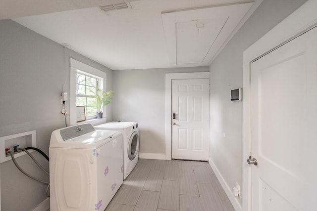 laundry area featuring separate washer and dryer