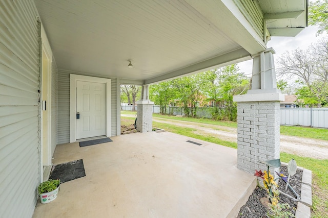 view of patio featuring a porch