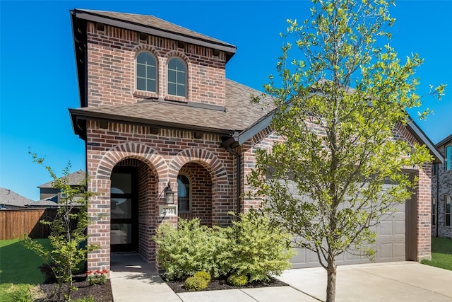 view of front of property featuring a garage