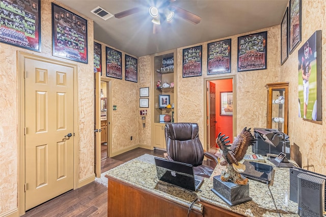 office featuring ceiling fan, built in features, and dark hardwood / wood-style flooring