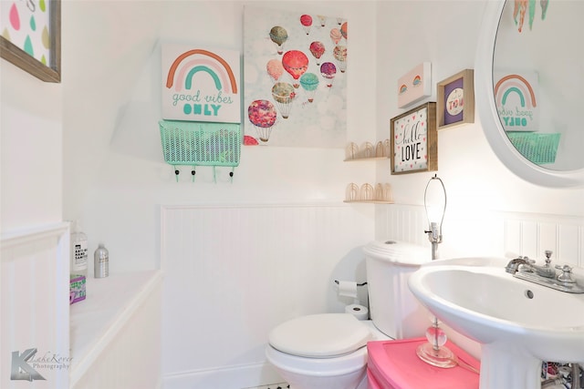 bathroom with sink and toilet